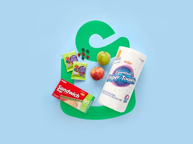 Various grocery and essentials items on a blue background